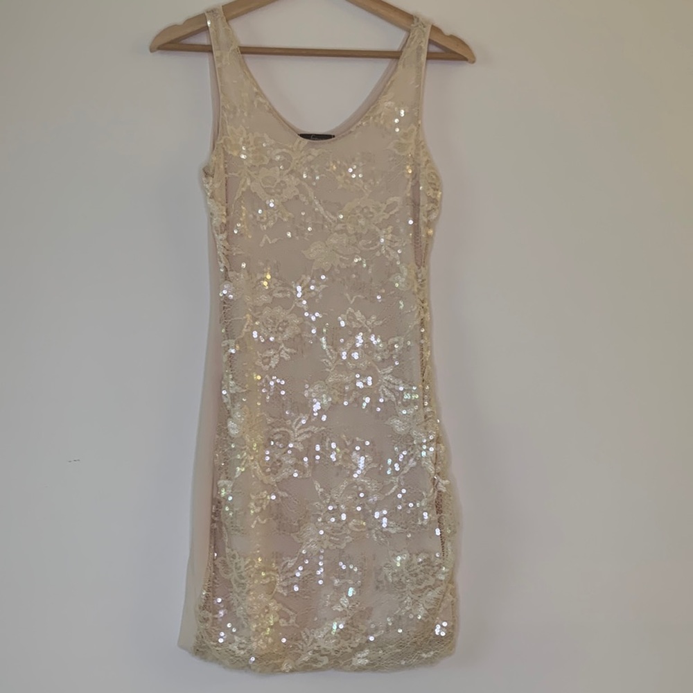 Soprano from Macy’s. Worn once. Cream sequin mini dress